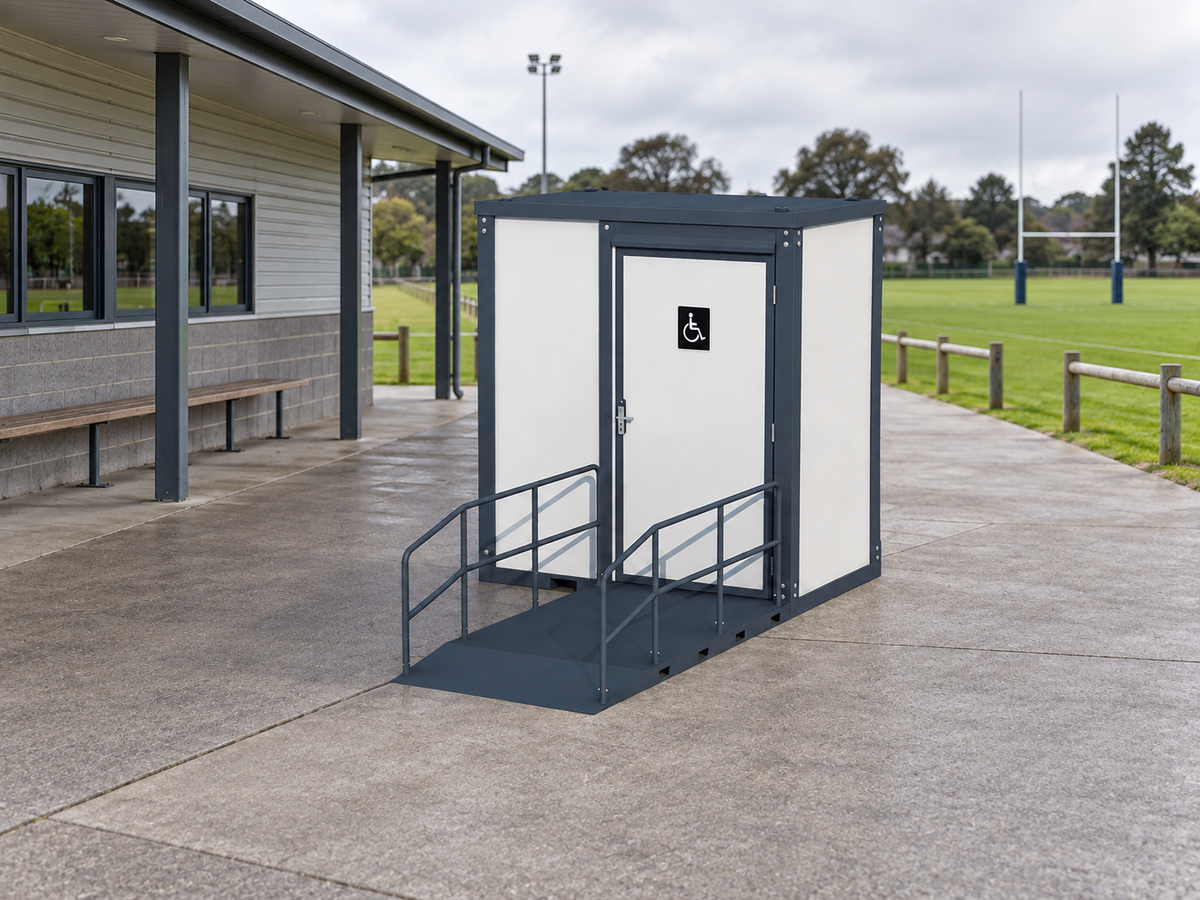 Ramp-Equipped Mobile Toilet at a Community Sports Facility